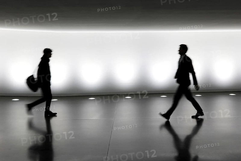 Members of the German Bundestag walk through a tunnel. The tunnel connects the Reichstag and the Paul Loebe Haus, Berlin, 13 November 2018