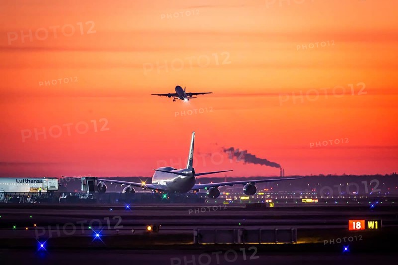 Early in the morning at the airport in front of sunrise, a Boeing 747 aircraft stands ready for take-off on the runway, Fraport, Frankfurt am Main, Hesse, Germany, Europe