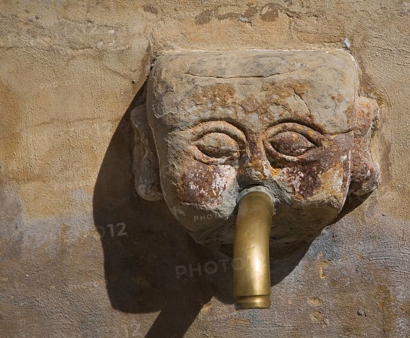 Stone water fountain face village of Grazalema, Cadiz province, Spain, Europe