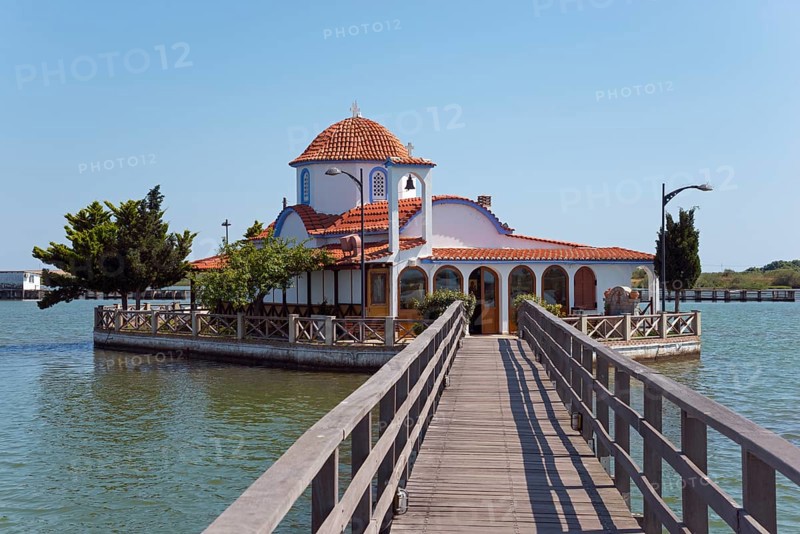 Small church on the waterfront connected by a wooden bridge, Monastery of St Nicholas, Monastery of Agios Nikolaos, Agiou Nikolaou, Vistonidas Burma Lagoon, Porto Lagos, Xanthi, Eastern Macedonia and Thrace, Greece, Europe