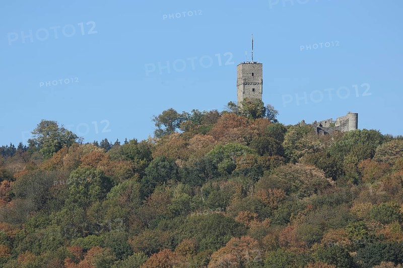 Falkenstein Castle in autumn forest, Koenigstein, Taunus, Hesse, Germany, Europe