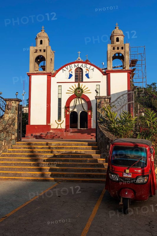 Motorbike taxi in front of the Inglesia Ave Maria church, Pluma Hidalgo, Pochutla, Oxaca state, Sierra Madre del Sur, Mexico, Central America