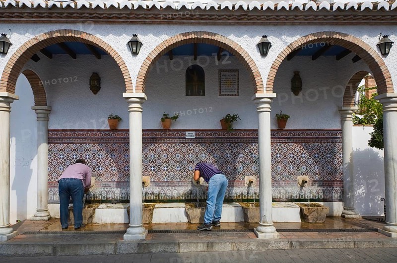 Moorish water fountain in the Andalucian village of Alcaucin, Malaga province, Spain, Europe