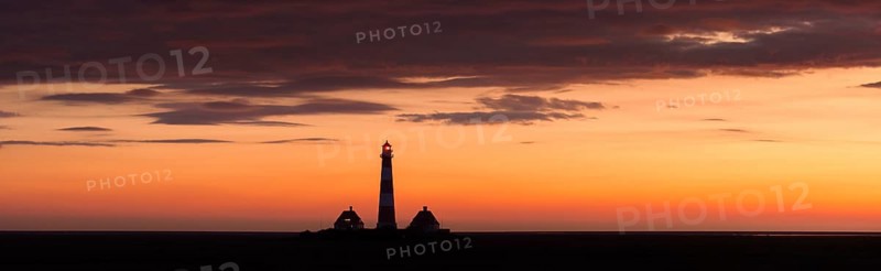 Lighthouse Westerheversand at sunset in summer, Westerhever, Wadden Sea National Park, North Frisia, Nordfriesland, Schleswig-Holstein, Germany, Europe