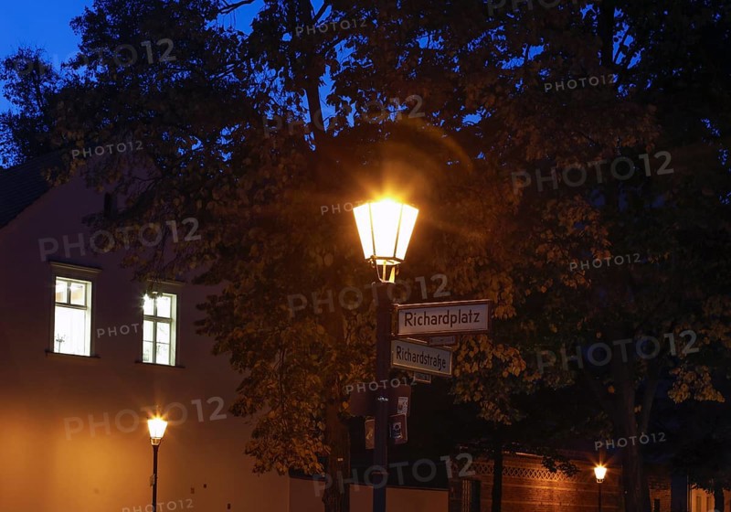 Old lanterns illuminate Richardplatz in Berlin's Neukoelln district. Richardplatz is the central square and village green of the former village of Rixdorf, which was divided into Deutsch-Rixdorf and Boehmisch-Rixdorf after 1737, 15 October 2019
