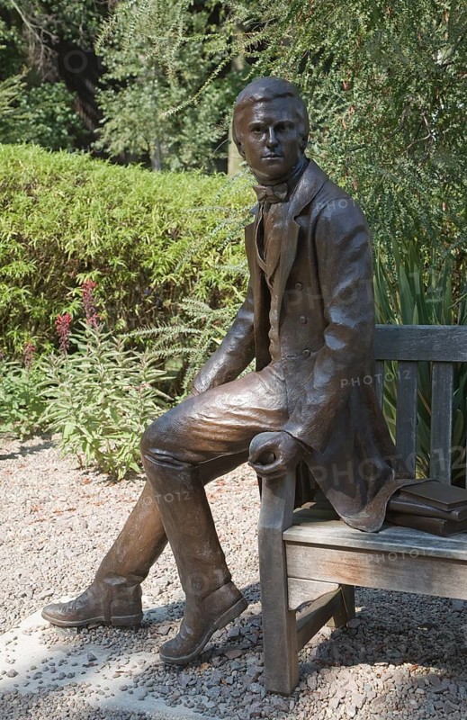 Charles Darwin as a young man sculpture 2002 by Anthony Smith, Christ's College, University of Cambridge, England, United Kingdom, Europe