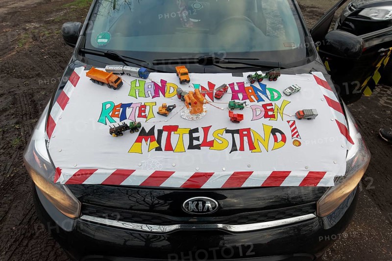 Placard with the theme Mittelstand on a car, farmers' protests, demonstration against the policy of the traffic light government, abolition of agricultural diesel subsidies, Duesseldorf, North Rhine-Westphalia, Germany, Europe