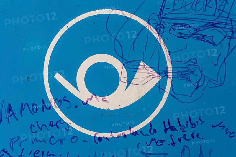 Post horn, horn of the post office, scribbled drawings and writing on a blue surface, Germany, Europe