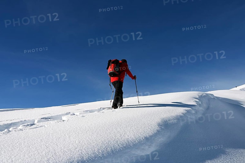 Snowshoe hiking in the Beverin nature park Park, Graubuenden, Switzerland, Europe
