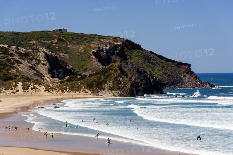 Surfing beach Playa Bodeiro in the Algarve, wide, red rock, rocky coast, nobody, clear, blue sky, summer holiday, beach holiday, sea, ocean, Atlantic Ocean, Atlantic Ocean, sandy beach, coast, beach, Atlantic coast, national park, geography, climate, travel, sun, nature, natural landscape, beach landscape, Aljezur, Carrapateira, Sagres, Portugal, Europe