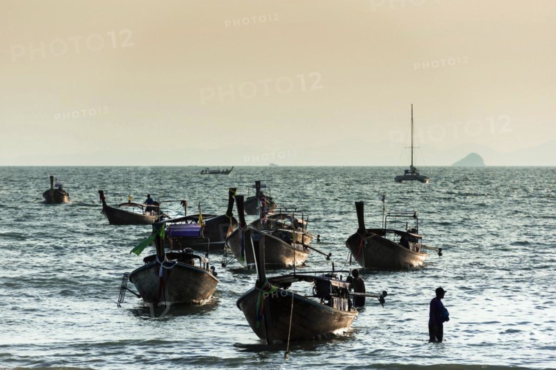 Longtail boats in the evening sun, wooden boat, boat, fisherman, fishing boat, water taxis, ferry boats, sea, tourism, travel, holiday, Krabi, Thailand, Asia