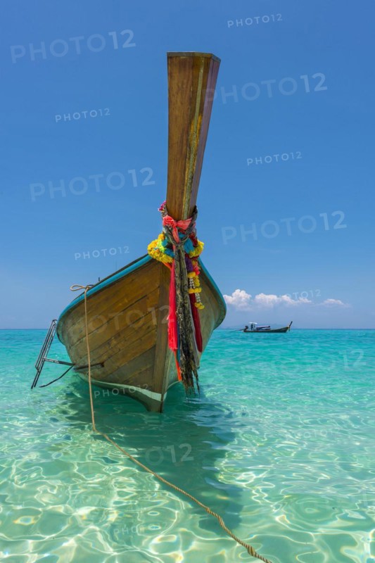 Longtail boat, fishing boat, wooden boat, decorated, tradition, traditional, faith, cloth, colourful, bay, sea, ocean, Andaman Sea, tropical, tropical, island, water, beach, beach holiday, Caribbean, environment, clear, clear, clean, peaceful, picturesque, sea level, climate, travel, tourism, paradisiacal, beach holiday, sun, sunny, holiday, dream trip, holiday paradise, paradise, coastal landscape, nature, idyllic, turquoise, Siam, exotic, travel photo, sandy beach, seascape, Phi Phi Island, Thailand, Asia