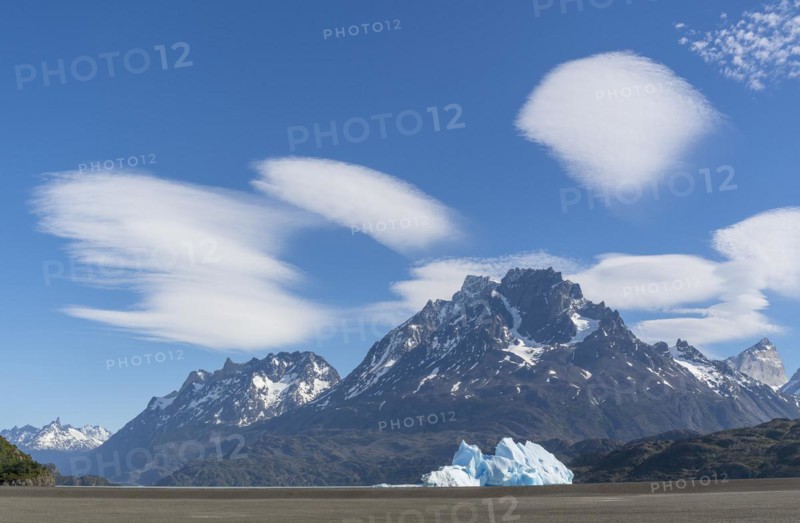 Iceberg and cloud formation, Lago Grey, Torres del Paine National Park, Parque Nacional Torres del Paine, Cordillera del Paine, Towers of the Blue Sky, Region de Magallanes y de la Antartica Chilena, Ultima Esperanza Province, UNESCO Biosphere Reserve, Patagonia, End of the World, Chile, South America