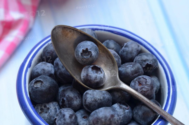 Blueberries in cup, cultivated blueberry