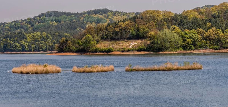 Landscape of lake with three small islands in the middle of lake in South Korea