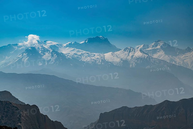 Desert mountain scenery with the Annapurna mountain range in the background, Kingdom of Mustang, Nepal, Asia