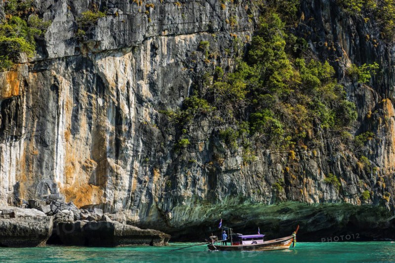 Fisherman on a longtail boat at Maya Bay, boat, wooden boat, local, tradition, Thai, Asian, traditional, sea, ocean, Andaman Sea, tropics, tropical, island, rock, cliff, water, fishing boat, travel, tourism, holiday, dream trip, holiday paradise, flora, paradise, coastal landscape, nature, idyllic, turquoise, Siam, exotic, travel photo, Ko Phi Phi Don, Thailand, Asia