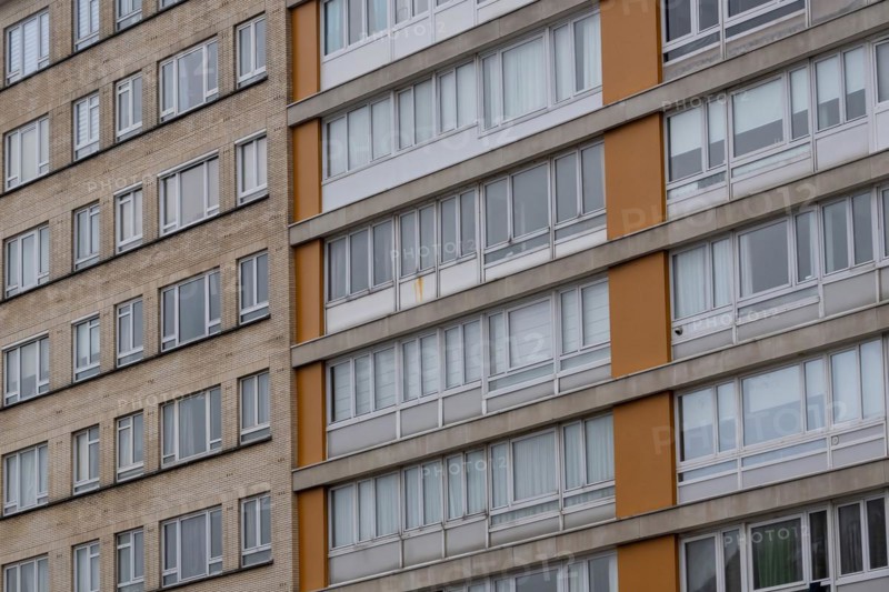 Urban apartment complex with orange-coloured balconies and many windows, Blankenberge, Flanders, Belgium, Europe