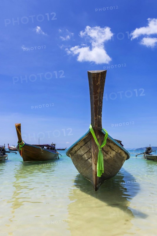 Longtail boat for transporting tourists, water taxi, taxi boat, ferry, ferry boat, fishing boat, wooden boat, boat, decorated, tradition, weather, traditional, bay, sea, ocean, Andaman Sea, tropics, tropical, water, travel, tourism, paradise, beach holiday, sun, sunny, holiday, idyllic, turquoise, Siam, exotic, travel photo, Krabi, Thailand, Asia