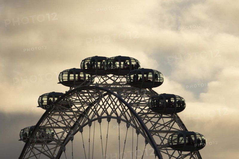 London Eye or Millennium Wheel tourist observation wheel close up of pods at sunset, City of London, England, United Kingdom, Europe