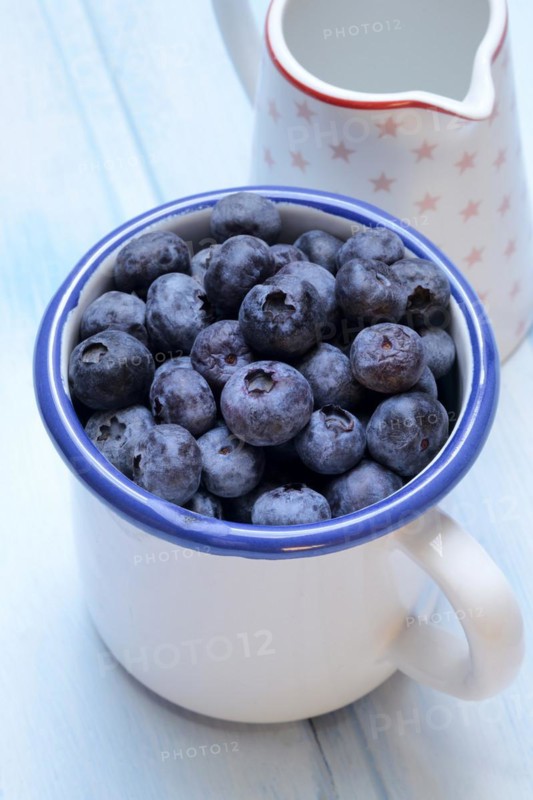 Blueberries in cup, cultivated blueberry