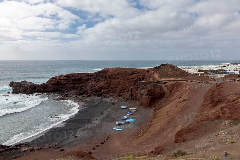 Fishing boats on the black beach of El Golfo, volcanic crater, Lanzarote, Canary Islands, Spain, Europe