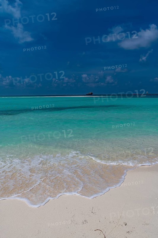 Turquoise waters on a white sand beach, Bangaram island, Lakshadweep archipelago, Union territory of India