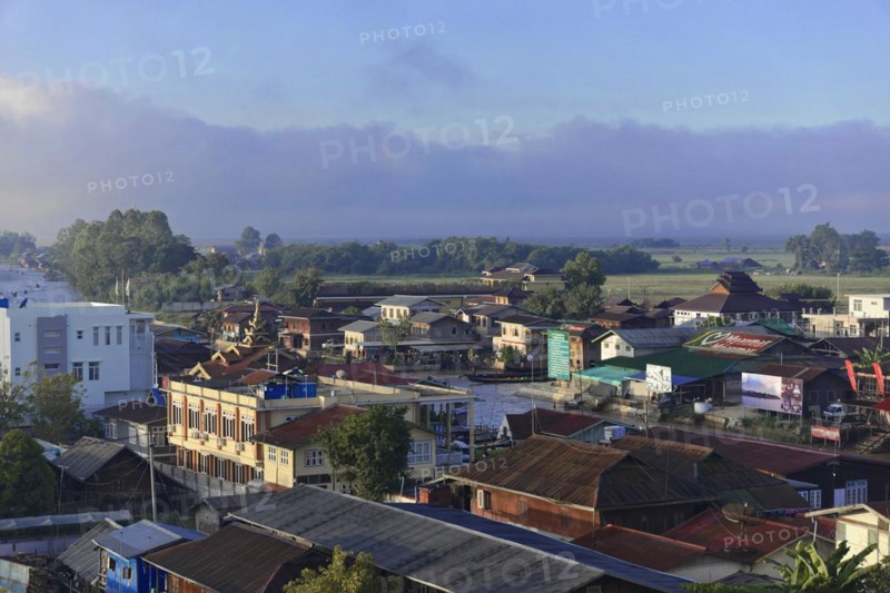 View of a town with traditional buildings at dawn, Pindaya, Inle Lake, Myanmar, Asia