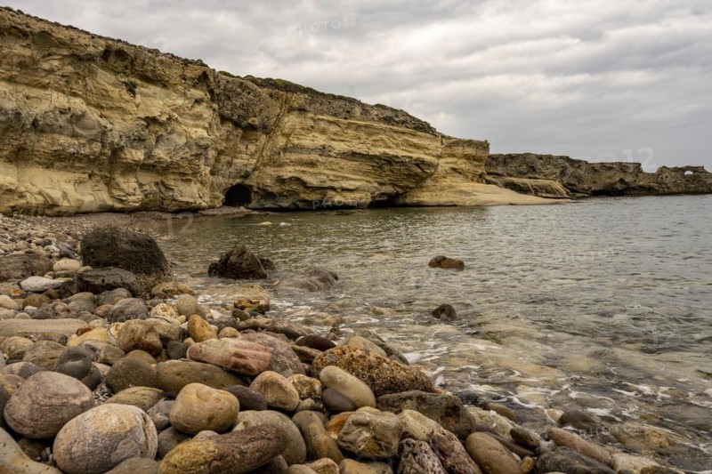 Beach with colourful stones near Malolo, Milos, Cyclades, Greece, Europe