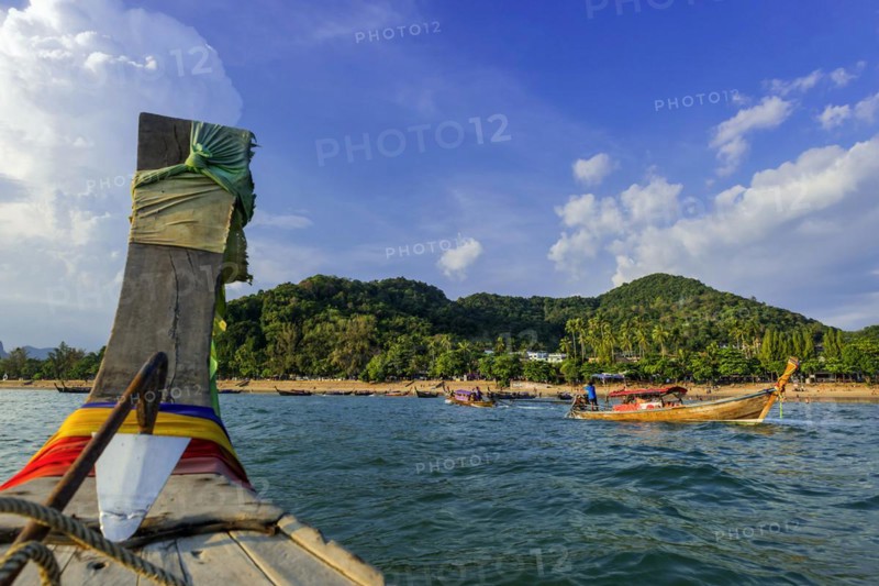 Longtail boat for transporting tourists, water taxi, taxi boat, fishing boat, wooden boat, boat, decorated, tradition, traditional, bay, sea, ocean, Andaman Sea, tropics, tropical, island, water, travel, tourism, paradise, beach holiday, sun, sunny, holiday, dream trip, holiday paradise, paradise, coastal landscape, nature, idyllic, turquoise, Siam, exotic, travel photo, Krabi, Thailand, Asia