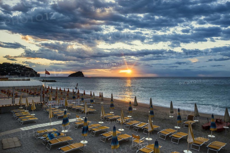 Empty beach and beach loungers, sunrise, Spotorno, Riviera di Ponente, Liguria, Italy, Europe
