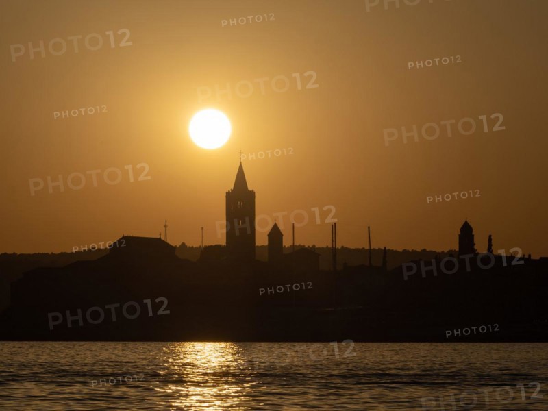 Sunset, silhouette of the church towers of Rab, town of Rab, island of Rab, Kvarner Gulf Bay, Croatia, Europe