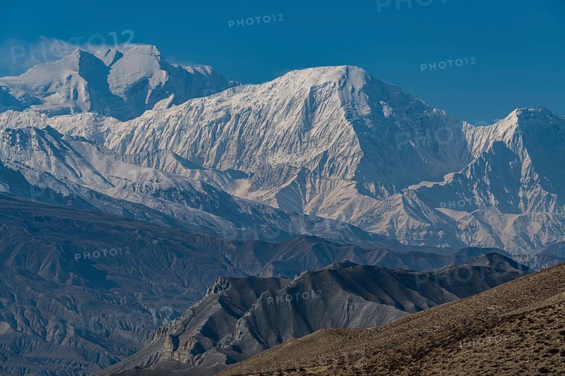 Desert landscape before the Annapurna mountain range, Kingdom of Mustang, Nepal, Asia