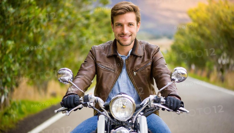 AI generated, EA young man rides his motorbike through an autumn landscape