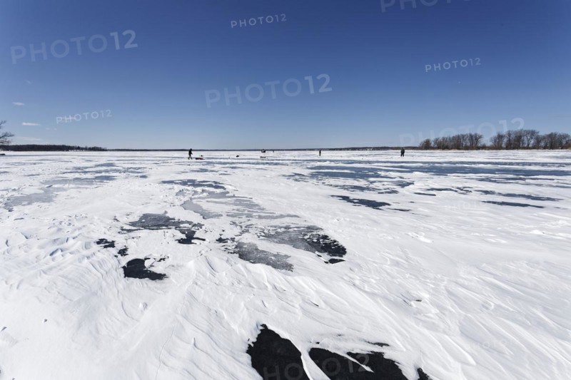 Winter, snow drifts on frozen riverscape, Saint Lawrence River, Province of Quebec, Canada, North America