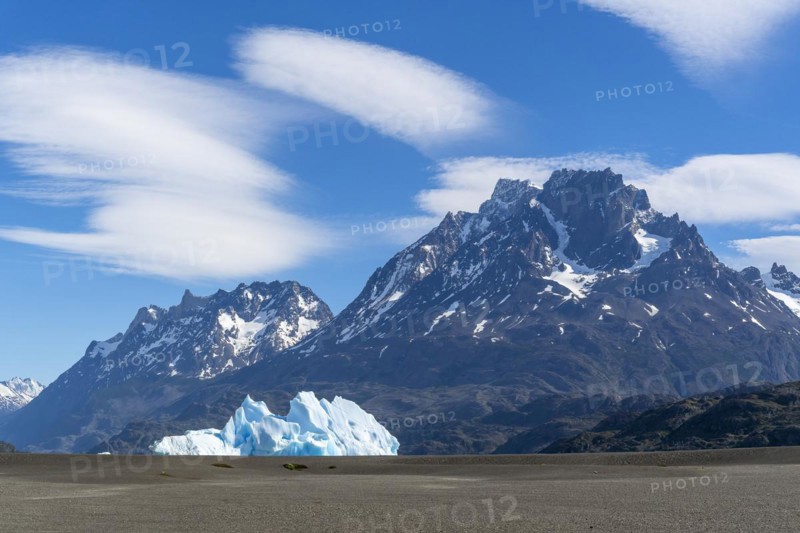 Iceberg and cloud formation, Lago Grey, Torres del Paine National Park, Parque Nacional Torres del Paine, Cordillera del Paine, Towers of the Blue Sky, Region de Magallanes y de la Antartica Chilena, Ultima Esperanza Province, UNESCO Biosphere Reserve, Patagonia, End of the World, Chile, South America