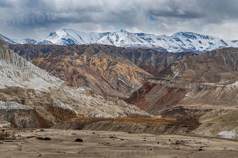 Vast landscape with the snow-covered mountains around Lo Manthang, Kingdom of Mustang, Nepal, Asia