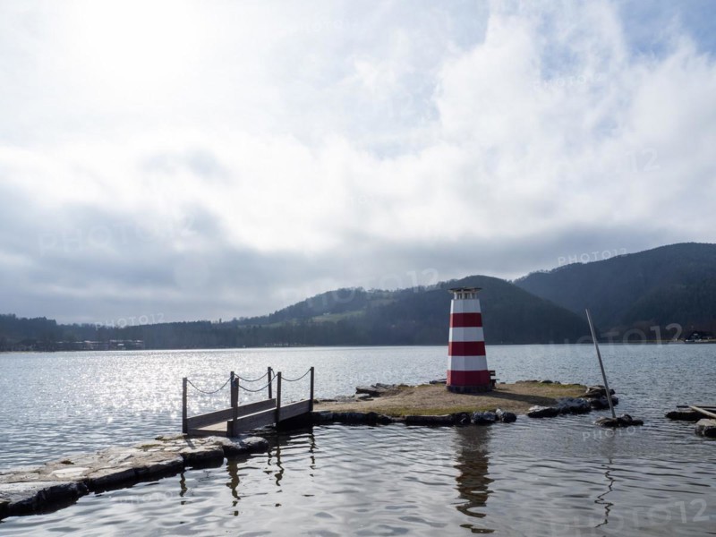 Cloudy sky, lighthouse at the Stubenbergsee, Stubenberg am See, Styria, Austria, Europe