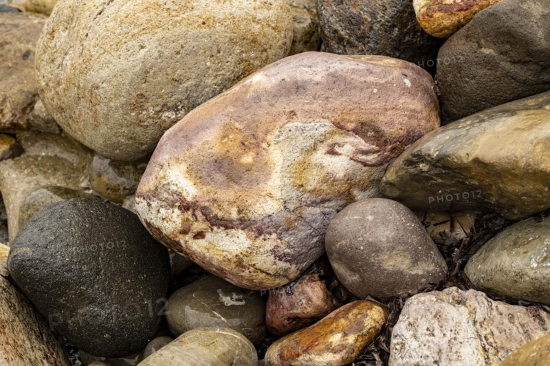 Colourful stones on the beach of Malolo, Milos, Cyclades, Greece, Europe