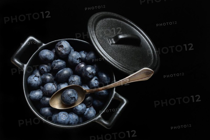 Blueberries with spoon in pots, cultivated blueberry, Vaccinium