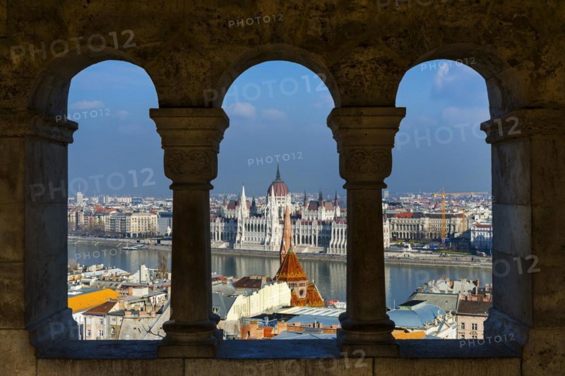 View through the facade of the Fisherman's Bastion to the Danube and the Parliament, politics, city view, travel, city trip, tourism, overview, Eastern Europe, architecture, building, history, historical, cityscape, river, capital, Budapest, Hungary, Europe