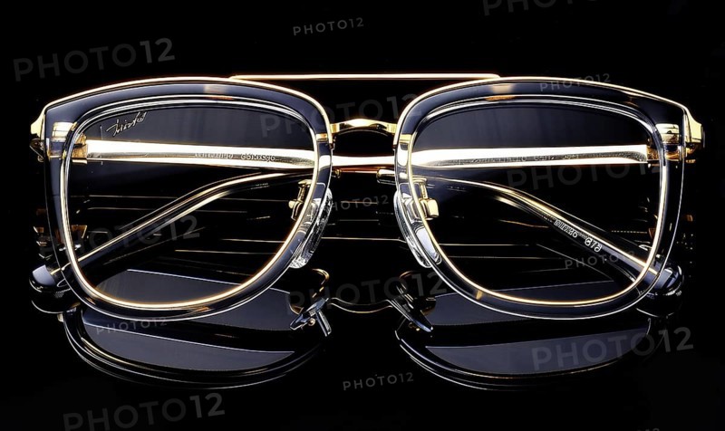 Stylish eyeglasses with clear lenses and gold trim offering a luxury feel AI generated
