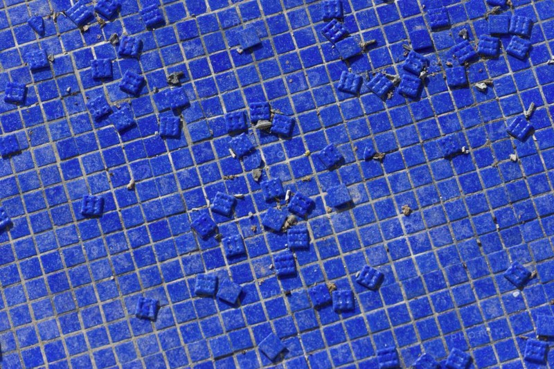 Blue tiles as texture, background, single, construction, building material, construction industry, destroyed, broken, dilapidated, pattern, surface, construction crisis, construction industry, economy, economic crisis, symbol, unfinished, craft, square, mosaic, mosaic tiles