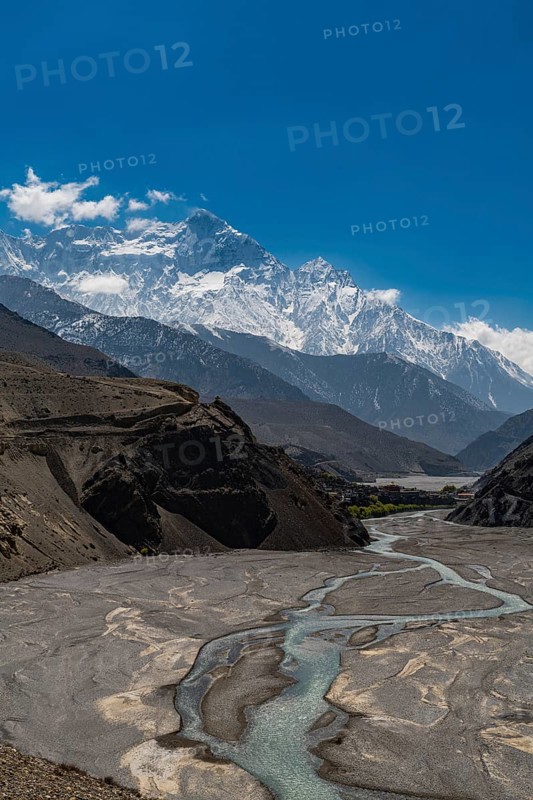 Huge riverbed before the Annapurna mountain range, Kingdom of Mustang, Nepal, Asia
