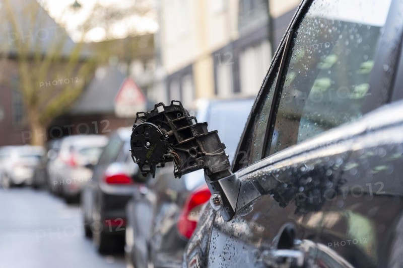 Torn off side mirror after an accident with a car that was parked on the side of the road, Duesseldorf, Germany, Europe