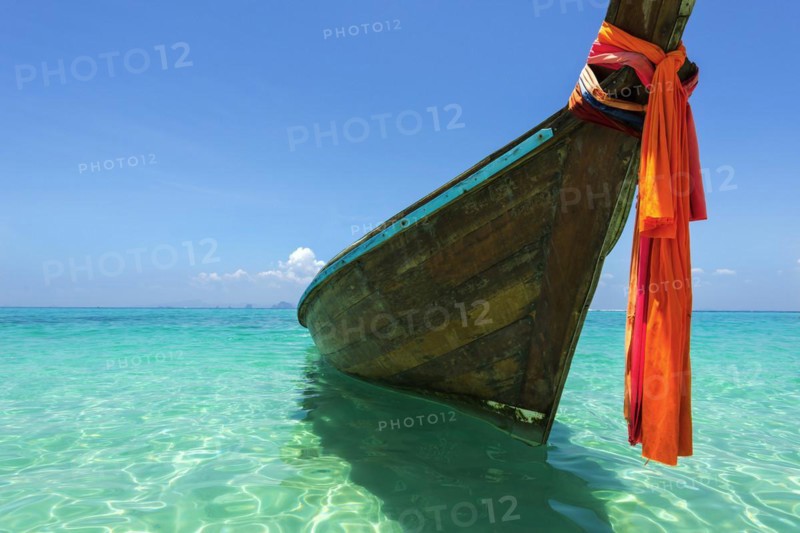Longtail boat, fishing boat, wooden boat, decorated, tradition, traditional, faith, cloth, colourful, bay, sea, ocean, Andaman Sea, tropical, tropical, island, water, beach, beach holiday, Caribbean, environment, clear, clear, clean, peaceful, picturesque, sea level, climate, travel, tourism, paradisiacal, beach holiday, sun, sunny, holiday, dream trip, holiday paradise, paradise, coastal landscape, nature, idyllic, turquoise, Siam, exotic, travel photo, sandy beach, seascape, Phi Phi Island, Thailand, Asia
