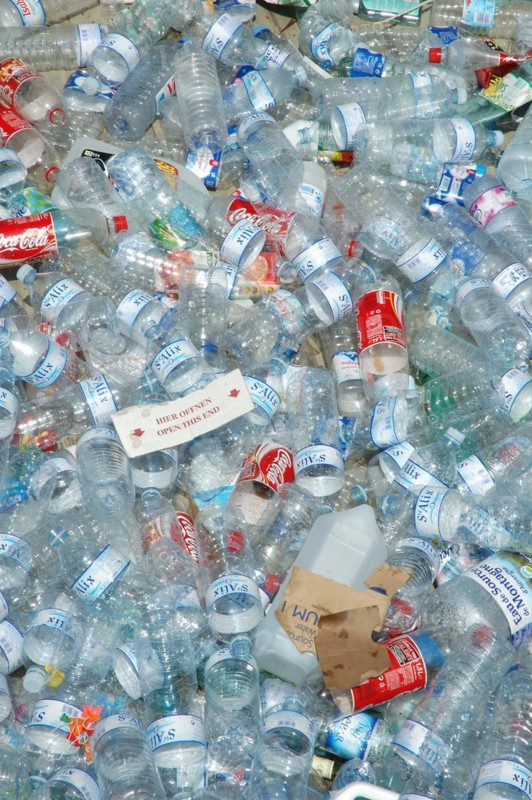 Numerous discarded plastic bottles create an environmental pollution problem, editorial