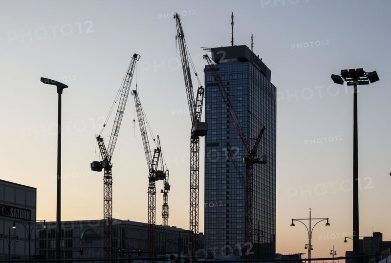 Cranes at the construction site of the Covivio high-rise, next to the Park Inn by Radisson Berlin hotel on Alexanderplatz, 08/03/2024
