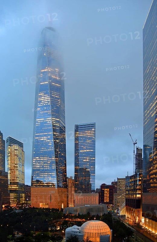 Skyscraper One World Trade Centre or Freedom Tower at the top shrouded in fog, at dusk, Ground Zero, Lower Manhattan, New York City, New York, USA, North America