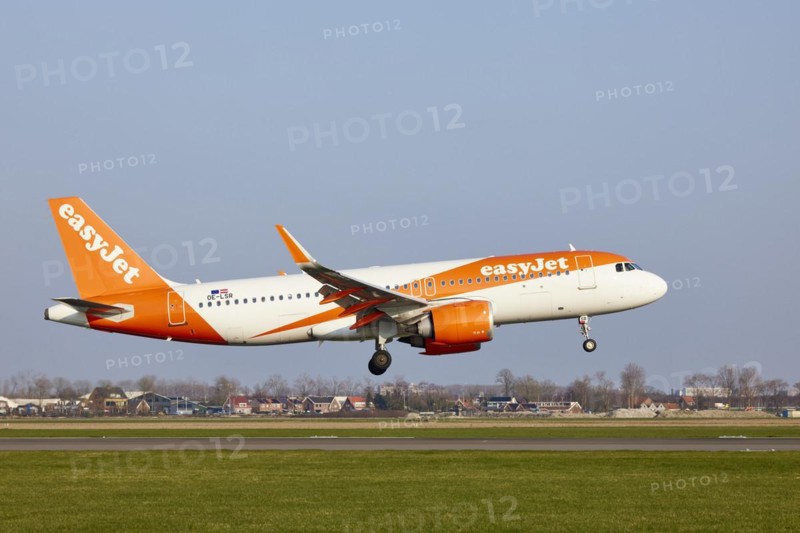 EasyJet Europe Airbus A320-251N with registration OE-LSR lands on the Polderbaan, Amsterdam Schiphol Airport in Vijfhuizen, municipality of Haarlemmermeer, Noord-Holland, Netherlands